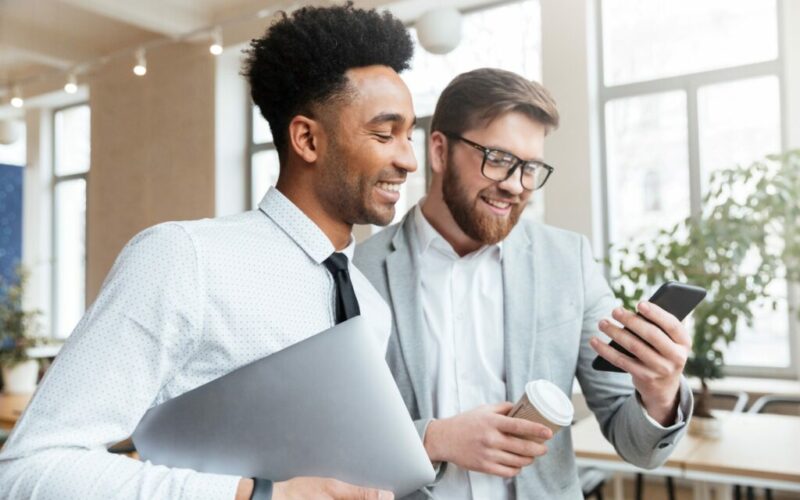 happy-businessmen-colleagues-talking-with-each-other smaller